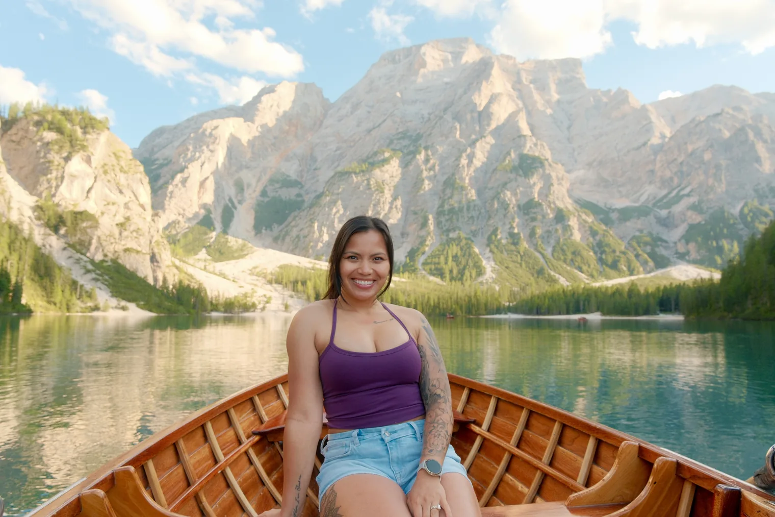 Jea Breshears, luxury travel advisor and founder of Journeys with JB, on Lago di Braies in the Italian Dolomites