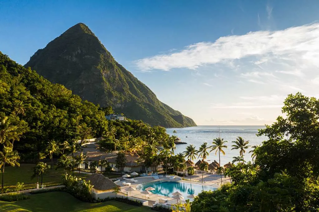 The Pitons rising above the St. Lucia coast