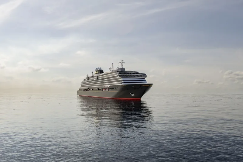 Explora III alongside in port, her full profile showing the added length amidships