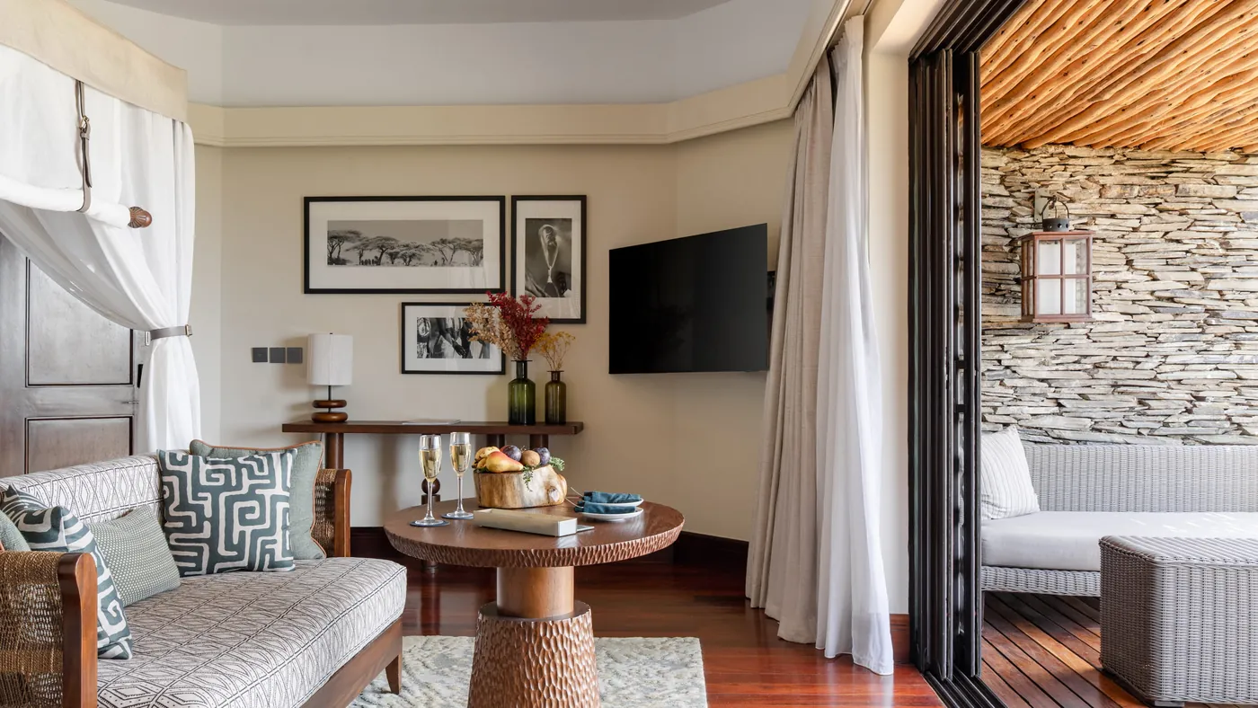 The Savannah Room sitting area beside the open doors to the deck