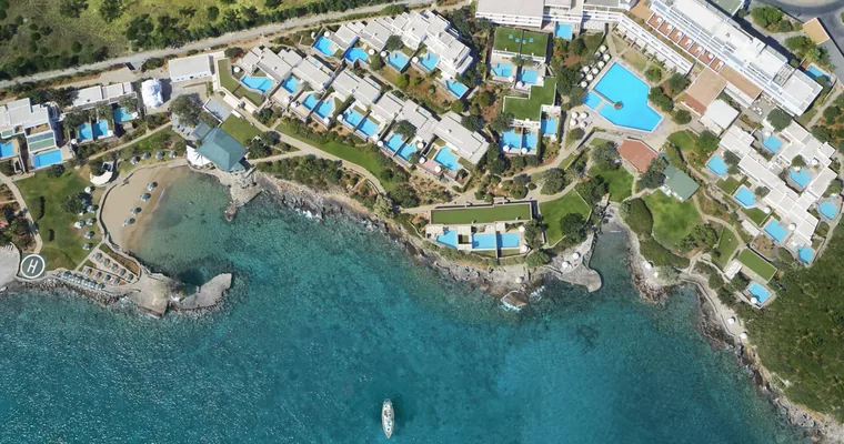 An aerial view of Elounda Mare and its gardens on Mirabello Bay