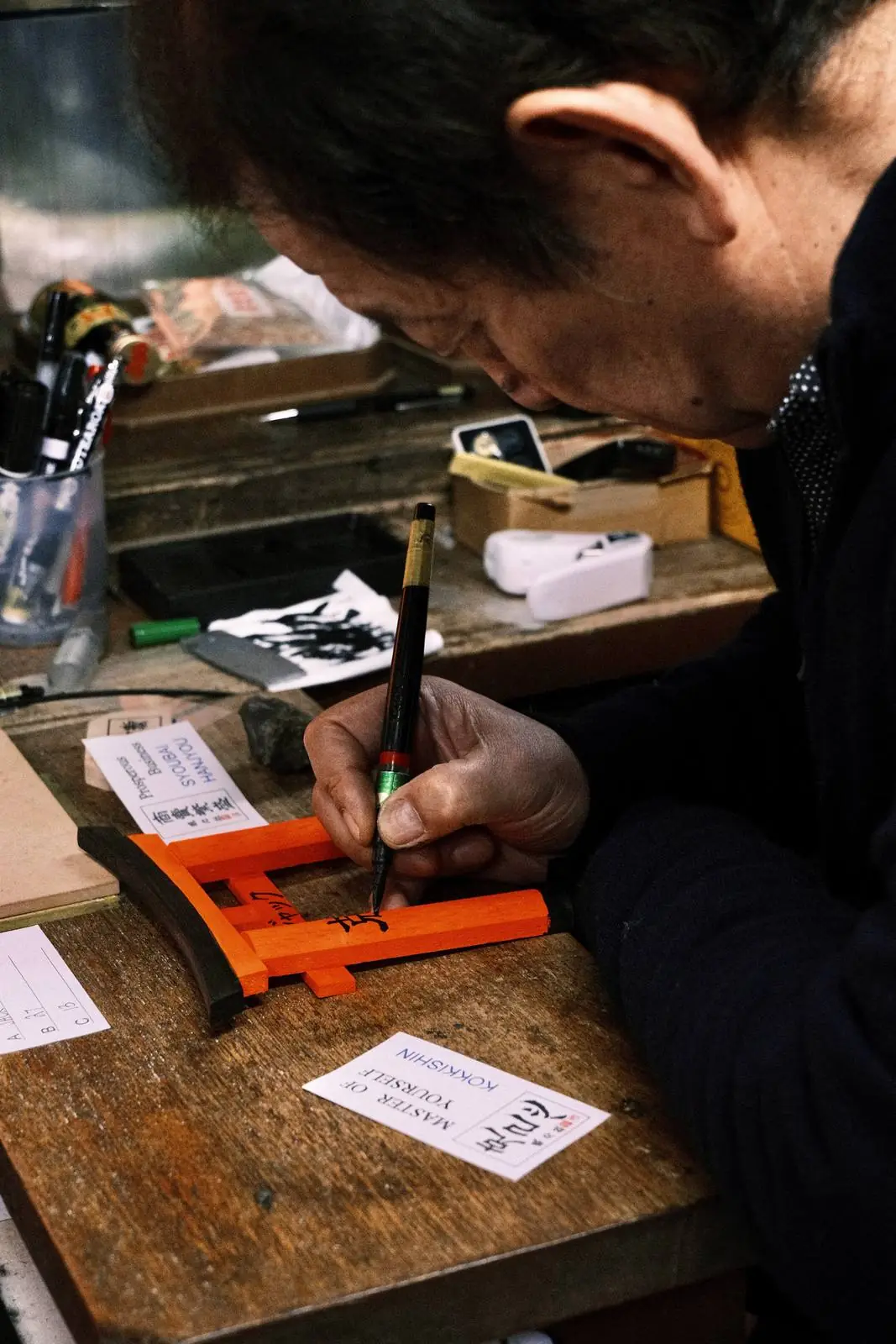 Japanese calligrapher at work