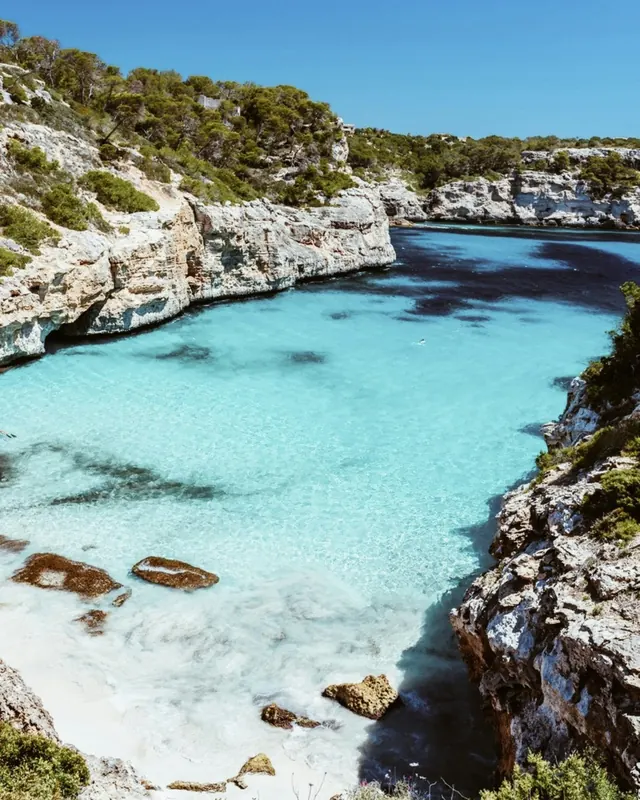 A turquoise cove between cliffs in Mallorca