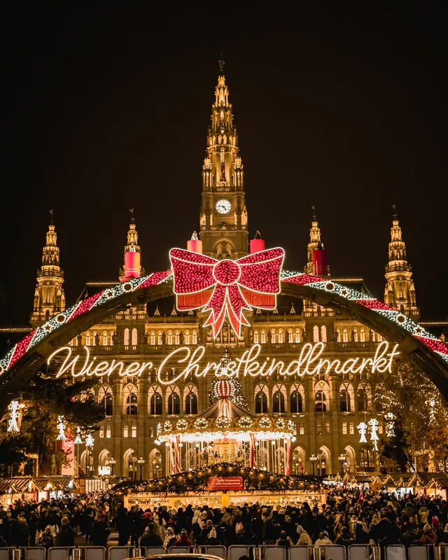 The Christmas market in front of Vienna's lit City Hall